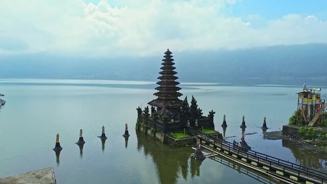 Aerial 4K footage of a historic Hindu temple in Bali. Pura or Balinese temple is a religious place in Indonesia.