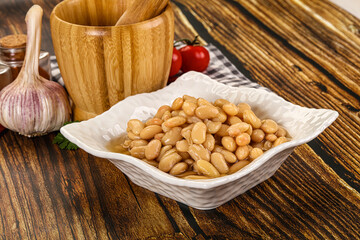 Baked white canned beans in the bowl