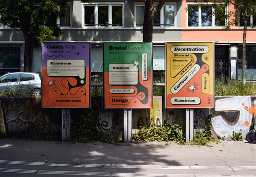 Mockup Of Three Vertical Customizable Posters On Street