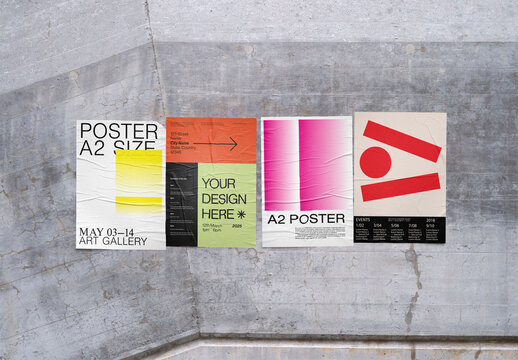 Mockup Of Four Vertical Customized Posters On Wall