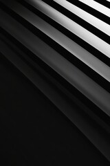 Obraz premium Minimalist black and white scene with parallel lines, dramatic shadows, and lighting