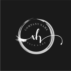 XH Elegant Circular Logo Design with Feather and Calligraphic Text
