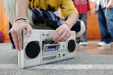 Holding Vintage Cassette Player with Close-Up View