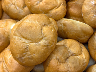 Leavened white buns after baking are very tasty as a breakfast food.