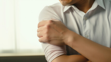 Close-Up of a Person Experiencing Elbow Pain and Discomfort