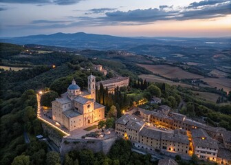 Fototapeta premium Aerial View of Montepulciano, Tuscany at Blue Hour - Illuminated Medieval Town