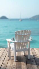 Serene White Lounge Chair on Wooden Deck Overlooking Turquoise Waters with Mountain Backdrop