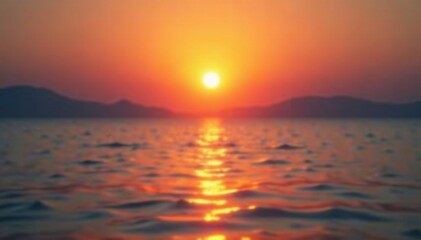 Naklejka premium Softly glowing sunset casting a warm light on the water, water, gentle glow