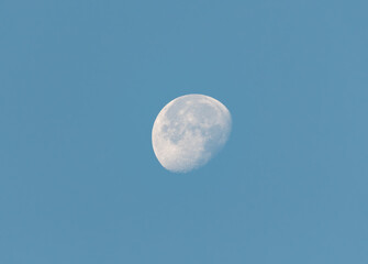 moon in the sky during daytime