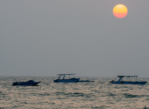 sunset on the beach, Candolim beach, india 