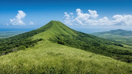 Fototapeta premium Lush green hilltop, tropical island vista, sunny sky, ocean view, travel brochure