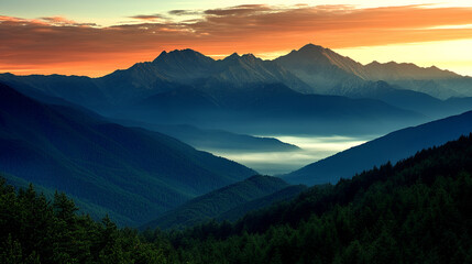 Obraz premium A mountain landscape of the Caucasus Mountains in Georgia, covered with fog at sunset, creating an atmosphere of mystery and grandeur. Perfect for imagery about the Caucasus, mountains, and natural la