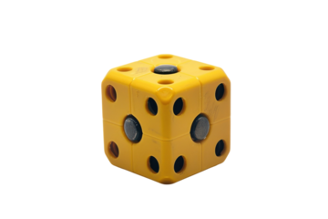 A vibrant yellow counting cube with colorful dots reflecting playful learning and creativity on a bright, clean surface isolated on transparent background