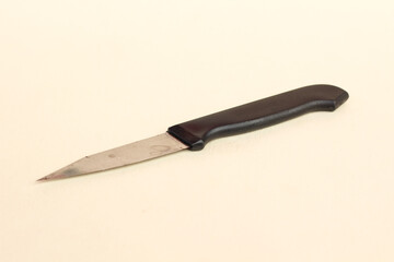 Close up of knife on a white background.