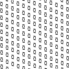 A group of thick dots and lines create a texture.