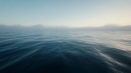 Fototapeta premium Serene Ocean Mist Shrouds Distant Hills