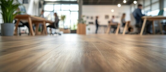 Obraz premium Blurred Office Space: Modern Workplace with Wooden Floors