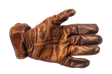 Vintage leather glove resting gently on a flat surface, showcasing its rich texture and warm tones in natural light isolated on transparent background