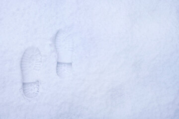 Impronte di scarpe sulla neve