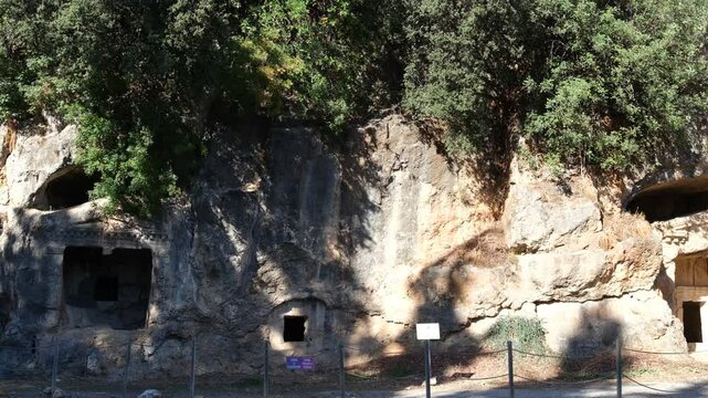 Ruins of the ancient city of Idyma. Lycian rock tombs. Akyaka holiday village. Mugla city. Turkey 