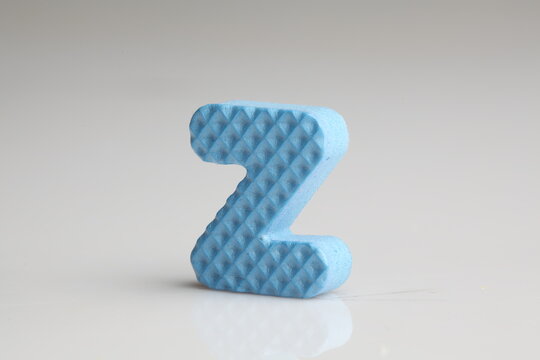 Z in colorful foam on a white background