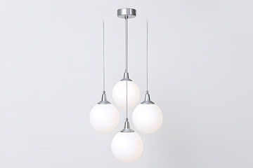 Modern chandelier with a cluster of hanging white glass orbs isolated on white background