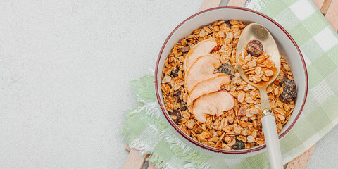 Vegan bowl with cereal granola with dried fruits. Ready to eat food, healthy breakfast concept