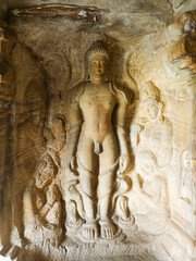 Sculpture of Tirthankara Parshvanatha or Bahubali with a serpent at his feet, Cave No. 4, Badami, Karnataka, India.