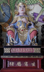 Statue of Ye Jian. The great guardian deity of the year Xin Hai - Zodiac Pig (born on 1911, 1971, 2031) governed by Tai Sui God, use it as your Wallpaper, Poster and Space for text, Selective focus.