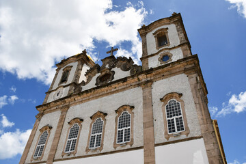Fototapeta premium The Church of Our Lord of Bonfim, in Salvador, Bahia, is a symbol of faith and religious syncretism. Famous for the Lavagem do Bonfim and its colorful ribbons, attracting devotees and tourists.