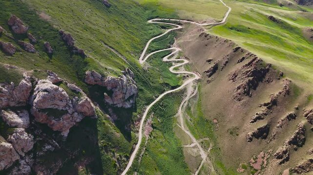 Aerial view of the winding road at Kalmak Ashuu Mountain Pass, Kyrgyzstan
