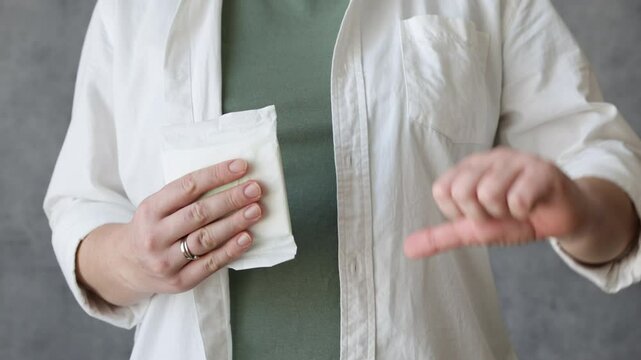 Choosing between pad and menstrual cup.