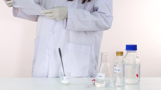 Scientist Preparing a Chemistry Experiment