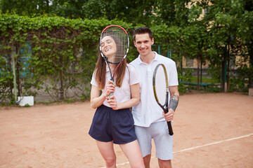 two young tennis players during practice