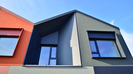 Terraced family homes in newly developed housing estate. The real estate market in the suburbs. New...