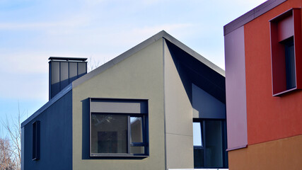 Terraced family homes in newly developed housing estate. The real estate market in the suburbs. New...