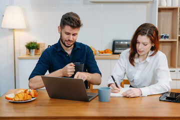 Office worker lifestyle people, Diversity business team discuss with new startup project sitting in the kitchen, analyze planning and financial statistics and investment market at office.