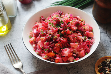 A bowl with Vinegret salad, a typical Russian dish	