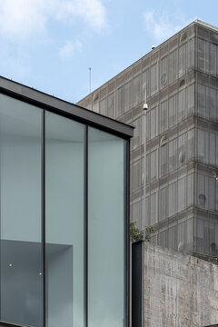 This intriguing architectural masterpiece features textured surfaces and modern designs, embodying the spirit of contemporary urban development and artistic exploration.