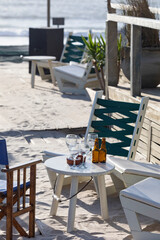 Beach terrace, sand, beach, cafe, summer, decoration, chairs, wood, white wood, director's chair, white table, relax, rest, leisure, vacation