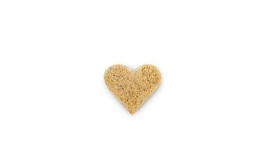 Wheat bread with cereals cut in heart shape and isolated on white background. Creative composition for Valentine's Day. Top view.