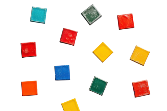 Colorful arrangement of vibrant geometric tiles scattered on a white surface, showcasing playful hues and artistic potential for creativity isolated on transparent background