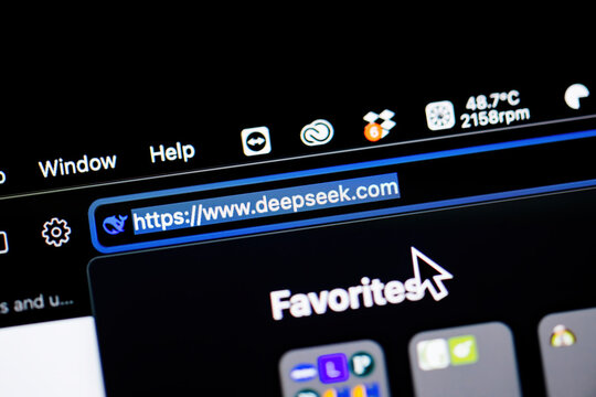 Paris, France - Jan 28, 2025: Close-up of a browser URL bar displaying https www.deepseek.com with a sleek interface and system icons in the background