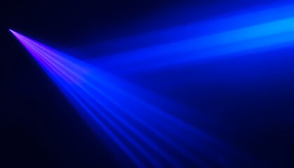 A dark background with vibrant blue and purple light rays emanating from a central point, creating a dramatic and ethereal atmosphere.