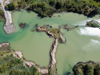 Gravel pit. Turbid water at the place where the gravel is extracted. Polluted water caused by...
