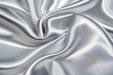 Obraz premium Elegant Black and Silver Silk Satin Fabric with Soft Folds and Luxurious Shine