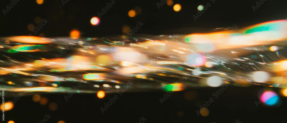 Aufkleber Bubbles creating a dynamic overlay texture with blurred motion against a dark background