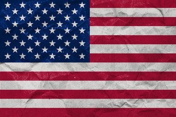 Fototapeta premium US Flag on Paper. American flag painted on crumpled craft paper.