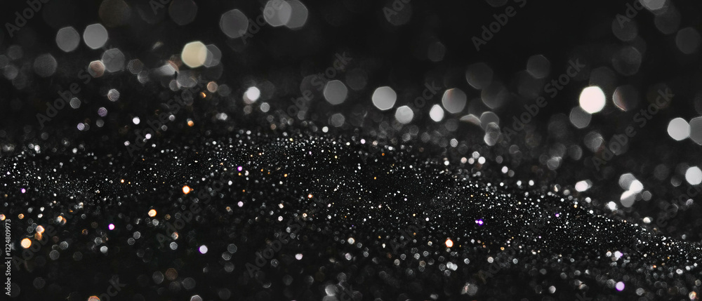 Poster Glitter texture with clustered particles on a black background creating an elegant atmosphere