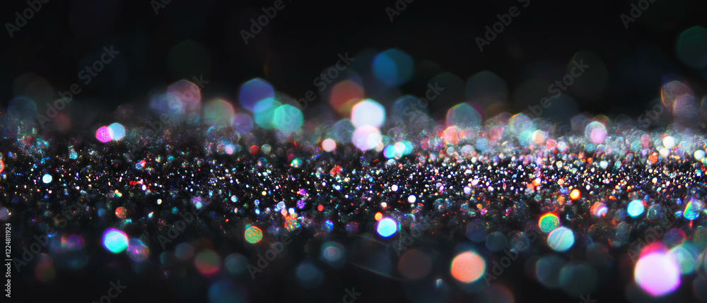 Poster Glitter overlay texture with sharp particles creating a vibrant display against a dark background